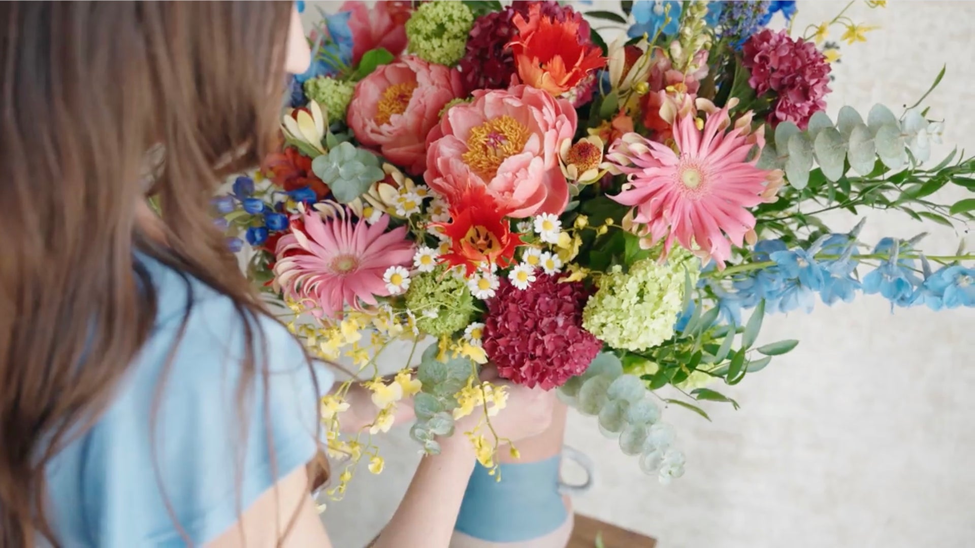 Load video: A day in the studio at The Bloom Of Time. Showcasing floral subscription arrangements of varying size.